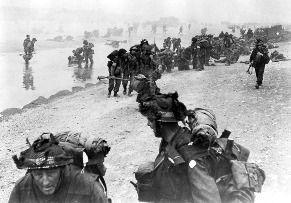 Soldiers of the British 3rd Infantry Division consolidate their position on Sword, easternmost of the Allied beachheads in Normandy. Although the British took Sword with a relatively light 683 casualties, traffic congestion combined with the only German counterattack of the day—from the 21st Panzer Division—stopped them short of their key objective of Caen, fifteen kilometers inland. (National Archives)